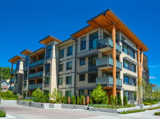 Brand new apartment building on sunny day in British Columbia, Canada